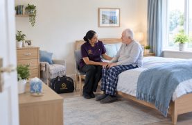 Complex End-of-Life Care – Homepage Service Revive Rise nurse providing compassionate support to an older man in his bedroom